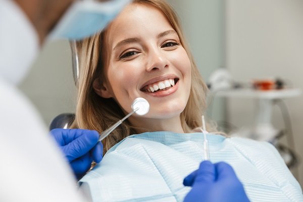 Dental patient exam — occurrence vs claims-made malpractice insurance for dentists