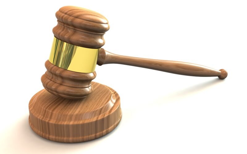 Dental malpractice lawsuit gavel — legal consequences for dentists